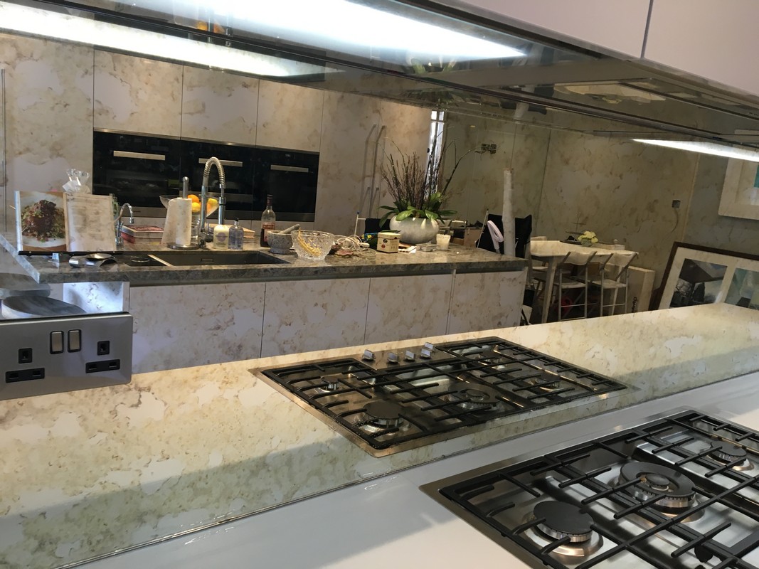 Mirror glass splashback in St Albans luxury kitchen