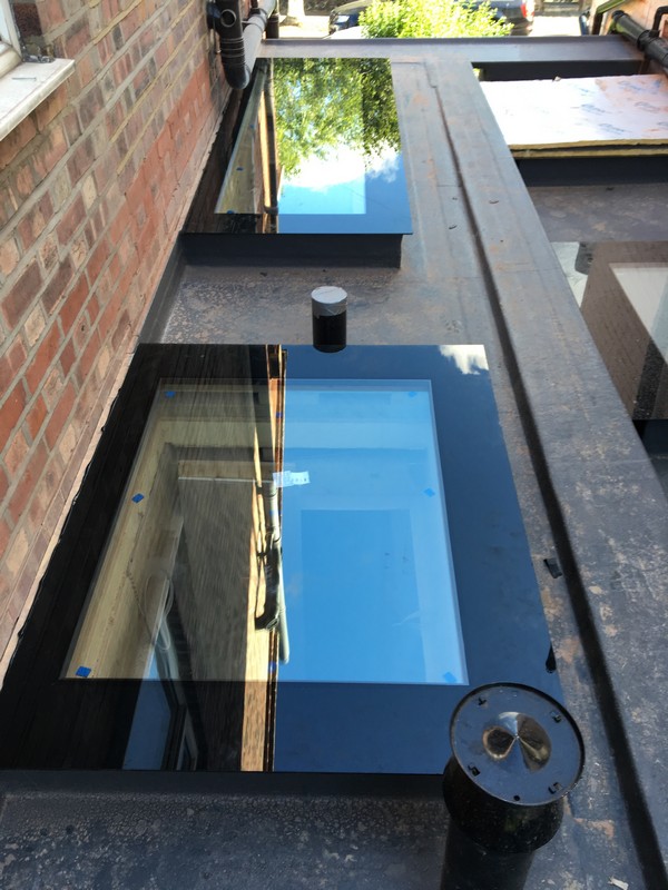 Multiple flat roof skylights on extension in St Albans