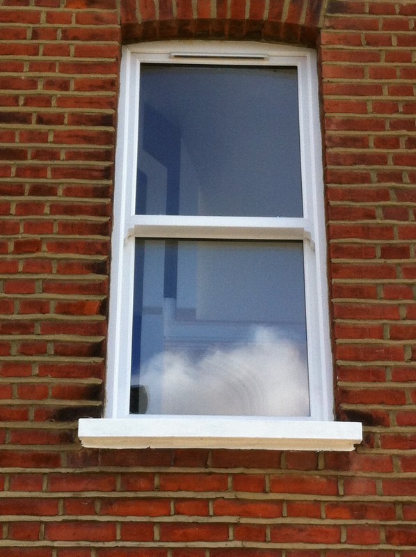 uPVC sash window on Victorian red brick house in St Albans